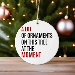 Festive Humor Ornament with Red and Black Text